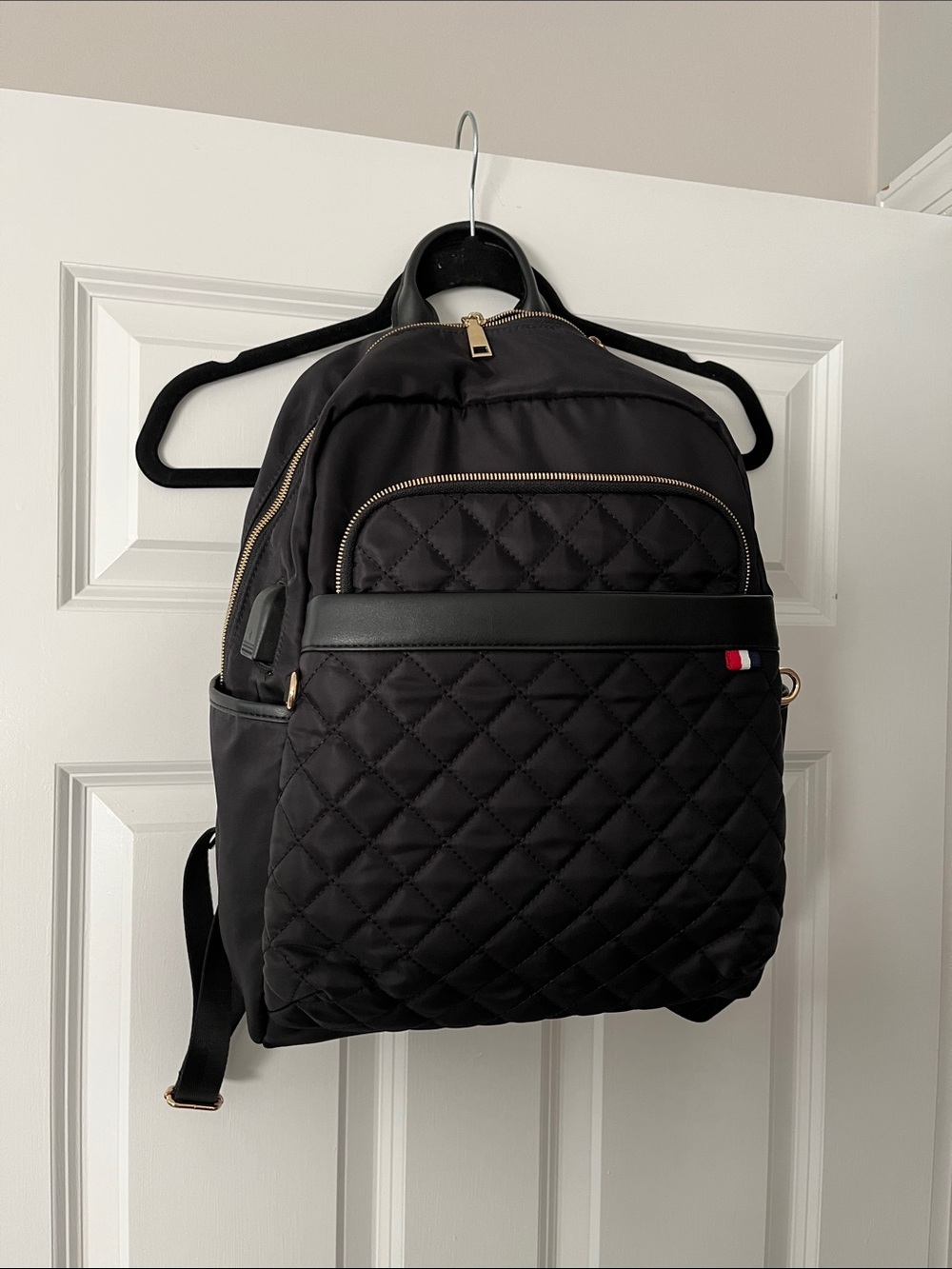 Quilted Black Women's Backpack with Gold Accents